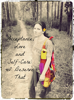 Text reads Acceptance, love and self care: I deserve that. Image is a fair skinned brunette female with a yellow flower behind her ear and a brightly colored bag on her shoulder. Behind her is a hiking trail and lots of trees.